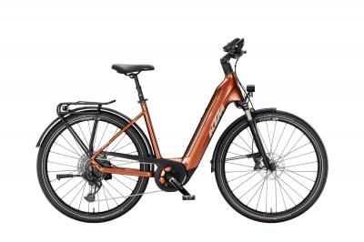 KTM Macina Tour CX 810 hněd&aacute; - UNI (2025)